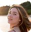 Smiling woman outdoors representing emotional well-being