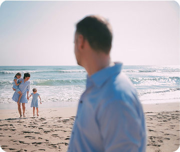 Family spending time together on the beach